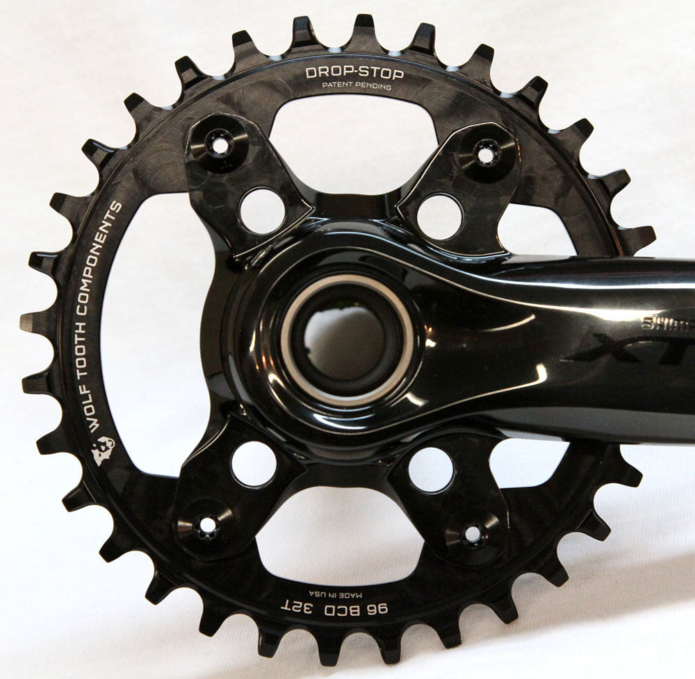 Wolf Tooth 96 BCD Chainring - 32t, 96 Asymmetric BCD, 4-Bolt, Drop-Stop, For Shimano XTR M9000 and M9020 Cranks, Black MPN: XTR9632 UPC: 812719021197 Chainring Shimano XTR M9000 96 BCD Asymmetrical Chainrings